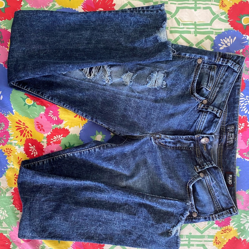 Silver Suki Mid Skinny Destructed. No skin shows as these are made with patches
